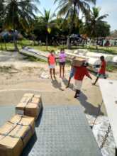 Unloading Antillana fish donations