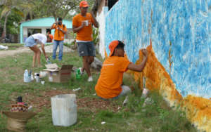 Painting a mural inviting to protect the ocean
