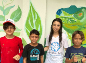 Artists of the community center's ecological mural