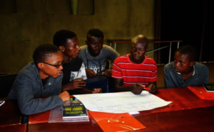 Participants doing group work during camp session