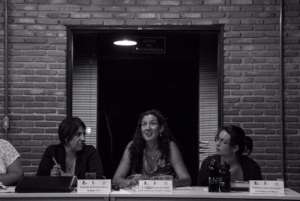 TINA (middle) explaining the work