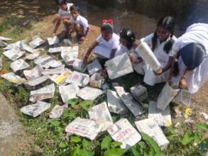 Saving the environment, making paper bags