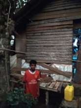 Children in front of their home