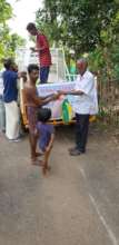 donating food groceries in kerala to flood victims