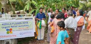 victims of floods in kerala receiving flood relief