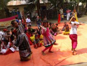 Kawra children dancing in a annual sports programm