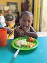 Girl Enjoying Breakfast