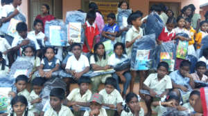 Children are happy with school bag,note books Etc.