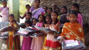 School bag and note books to tribal girls