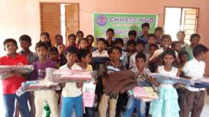 Tribal children receive school kit