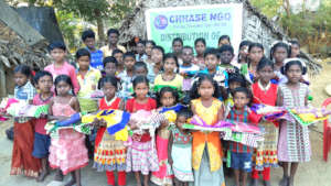 Tribal children dress distribution