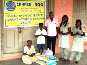 Orphan children receive food groceries