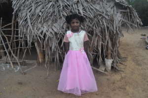Tribal girl wearing new dress