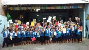 SCC Phnom Penh with books from UK friends