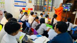 A monk teaches them moral in the class of CBE