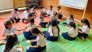 Childrens're having their food at CBE school