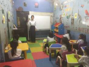 Ropini teach the pre-school children at CBE School