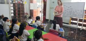 Our volunteer teacher's teaching at new school