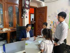 Students bring their Study Monitoring Books to CBE
