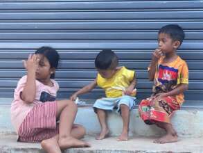 Children stay together while parents away for work