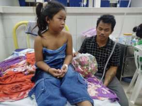 Sick daughter and father in the hospital