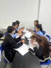 Pisey is learning with her classmates at the unive