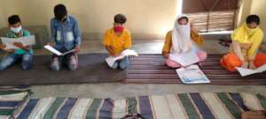 Teaching within homes in groups of five in UP
