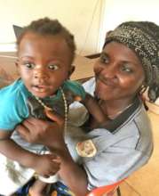 Chimamanda after surgery with mum who is so happy