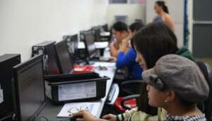 Facilitator working with her students.