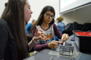 Young Deaf Women learning robotics