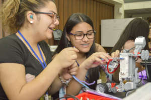 Young deaf women enjoying the robotics course