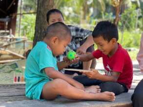 Vuthy learns through play.
