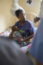 Lucia with her child