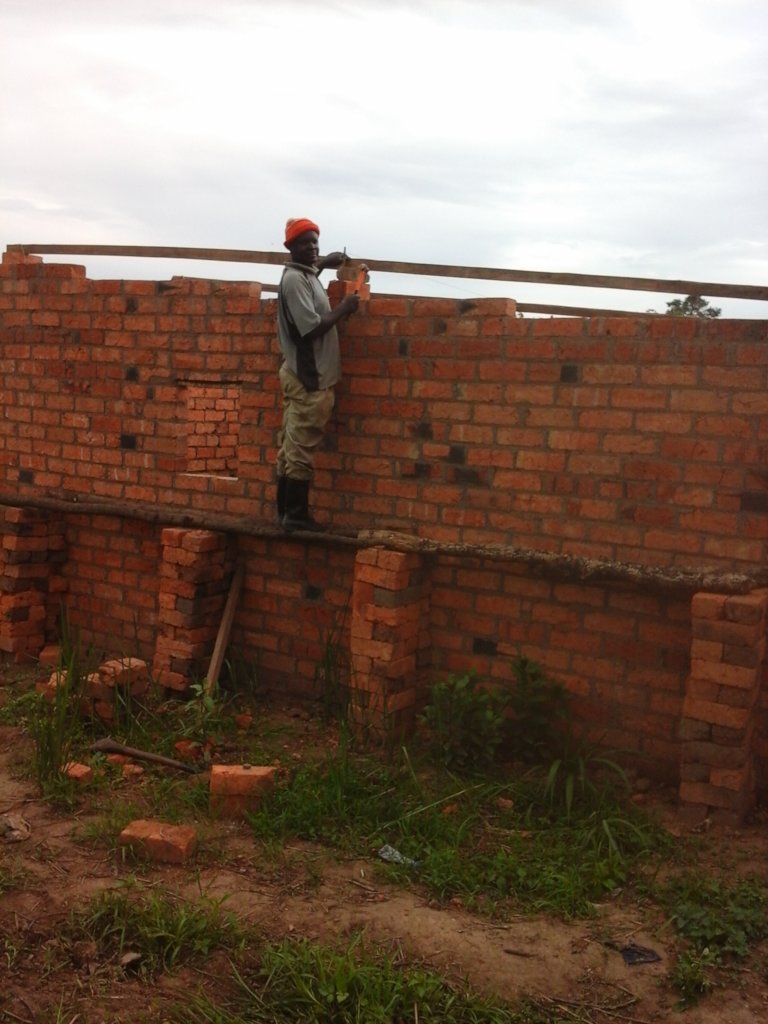 Songolo Build New Home of Self-made Bricks