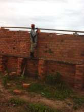 Songolo Build New Home of Self-made Bricks