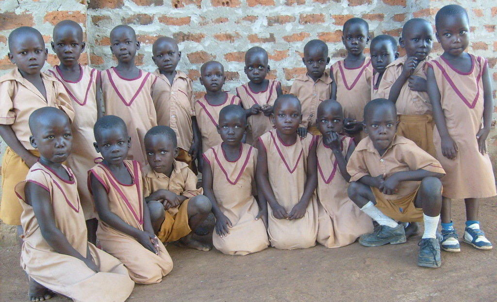 buy land and build a school with 9 classrooms