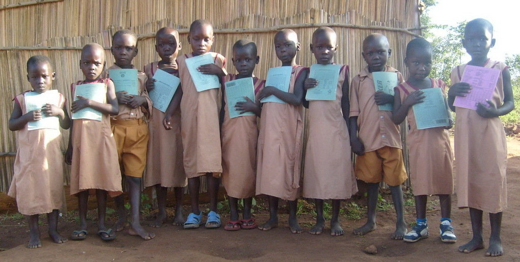 buy land and build a school with 9 classrooms