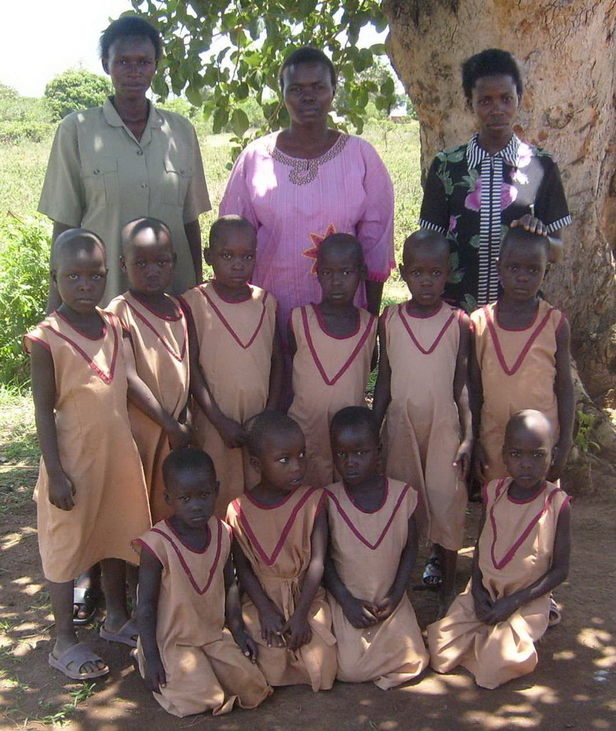 buy land and build a school with 9 classrooms