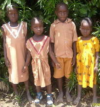 buy land and build a school with 9 classrooms