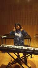Jaz playing piano