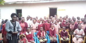 Teacher poses with elected My Money Club Officials