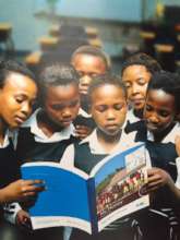 Pupils pose with the latest edition of MM toolkit