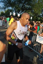 Board Member, Roland Pearson, finishes the swim