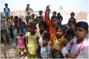 Children gather at our arrival in Lakhan