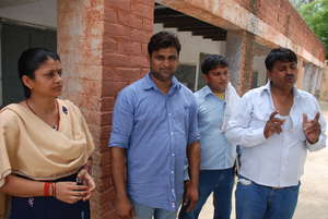 Teacher Rajinder Anand, far right, with colleagues