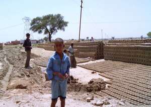 Boy who works in a brick kiln