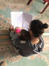 Anita passes on her learning to little Maja
