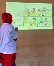 Home Health Volunteer Learning the BP/CR Flipchart