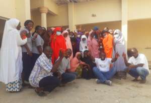 a group photo with birth attendants trained