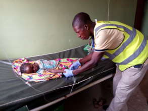 Volunteer providing care at PHC Doruwa